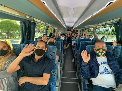 Happy travelers on their way to Playa del Carmen