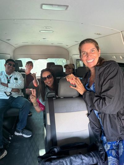 Travelers smiling after their comfortable ride